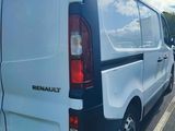 a white van that is parked in a parking lot