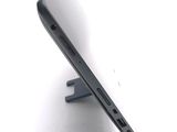 a close up of a cell phone on a stand