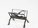 an image of a metal bench with a basket on top of it