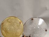 three glass vases sitting on top of a white table