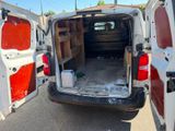 the back of a van with the door open and the back door open