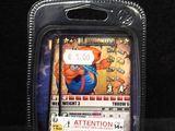 a card in a plastic case that has a picture of a cookie monster on it