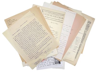 a lot of papers that are stacked on top of each other