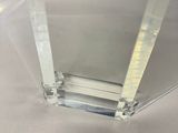 a clear glass vase that is sitting on a table