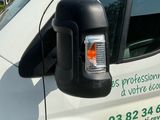 a van that has a side view mirror on the side of it