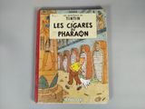 livre pour enfants français, *Les cigares du pharaon*, avec l'illustration d'un homme et d'un chien