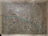 an old map of a city with a river in the middle