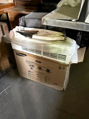a pile of boxes that are sitting on the floor