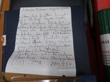 a piece of paper that has been written on a piece of paper