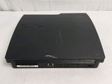 an open laptop computer sitting on top of a white surface
