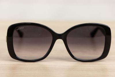 a close up of a pair of sunglasses on a table
