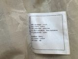 a close up of a label on a white shirt