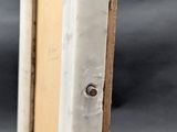 a close up of a door handle on a white door