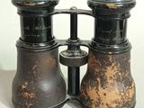 a close up of a pair of binoculars on a table