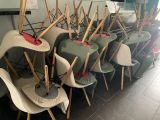 many chairs and umbrellas lined up in a row