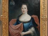 portrait of a woman in a blue dress holding a pink shawl