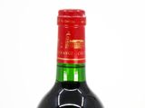 a bottle of wine that is sitting on a table