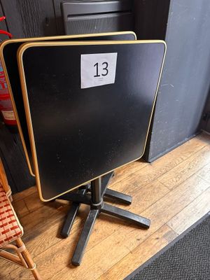 a table with a number on it and a chair in front of it