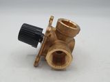 a close up of a brass valve on a white surface