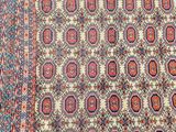 an antique persian rug with a geometric design on a blue ground