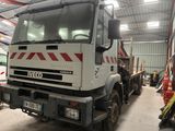 a large truck that is parked in a garage