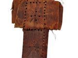 a wooden cross on a white background with a white background