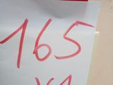 a sign on a box with a price tag attached to it