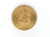 an image of a gold coin on a white surface