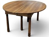 une photo d'une table en bois avec deux rallonges sur le plateau