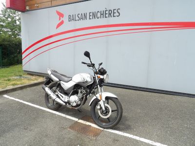 a motorcycle that is parked in a parking lot