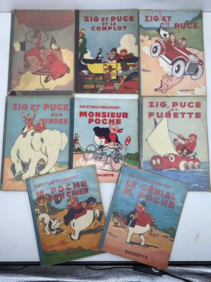 six livres pour enfants dans une boîte blanche posée sur une table