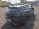 a black car that is parked in a parking lot