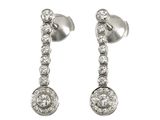 pair of diamond earrings on a white background