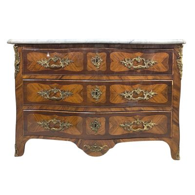 an image of a chest of drawers with marble top