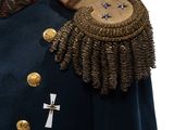 an image of a man in a military uniform with a medal on his shoulder