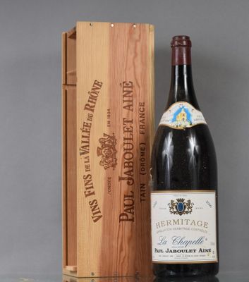 an image of a bottle of wine next to a wooden box