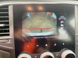 a picture of a car ' s rear view camera in the dash