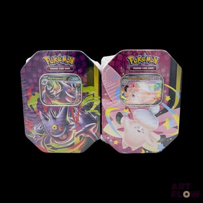two tins of pokemon trading cards are shown on a black background