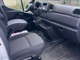 the interior of a van with the driver ' s seat folded down