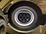 a close up view of the inside of a car ' s exhaust pipe