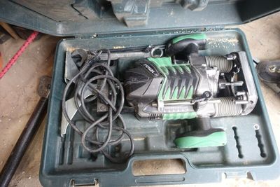 a tool in a case that is sitting on the floor