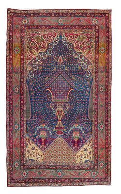 tapis persan ancien à motifs bleus et rouges
