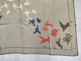 a picture of a handkerchief with birds and flowers on it