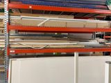 shelves in a warehouse with boxes and boxes on them