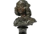 an image of a bronze bust of a woman on a marble base