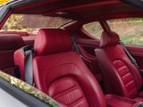 the interior of a car with red leather seats and black trims