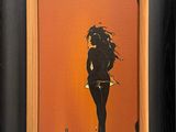 une image représentant un tableau où l'on voit une femme tenant un couteau à la main