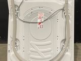 a washing machine with a hose attached to it