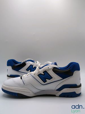 the new balance shoes are white and blue with black accents