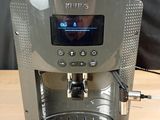 a coffee machine that is sitting on a wooden table